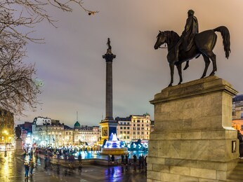 long exporure of illuminated trafalgar square, london, uk