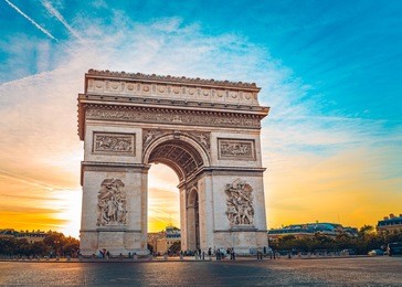 view of the arch of triumph in a parisian sunset