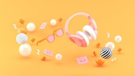 headphones and glasses float between the balls on the orange background 3d render