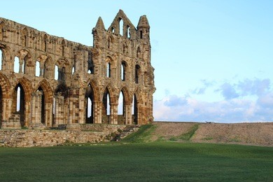 landscape shot of whitby abbey - made famous by bram stoker's dracula