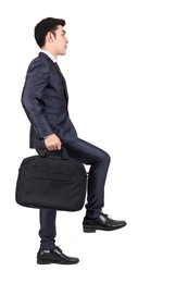 businessman step up a staircase isolated on white background