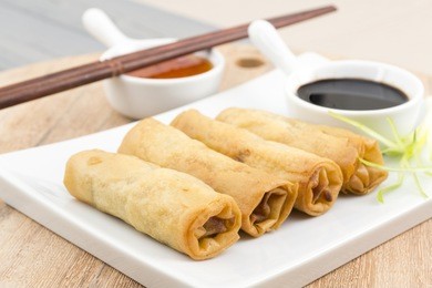 spring rolls - fried duck spring rolls served with soy sauce and sweet chili dip.