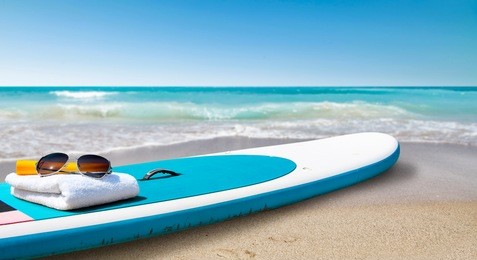 surfboard and summer time on beach. free space for your decoration. 