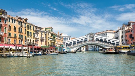 famous rialto bridge over the grand canal in venice, italy. rialto bridge (ponte di rialto) is one of the main tourist attractions of venice.