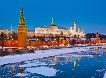 the grand kremlin palace and kremlin wall. winter evening. moscow. russia
