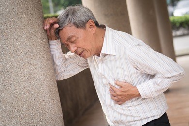 senior old man heart attack, hand holding chest