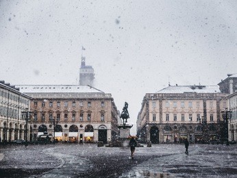 vintage looking piazza san carlo royal square in turin (torino), italy under the snow