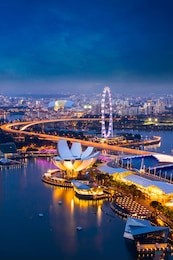 singapore cityscape at dusk. landscape of singapore business building around marina bay. aerial view of modern high building in business district area at twilight.