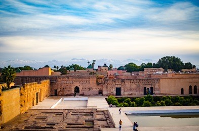 el badi palace sunset landscape with atlas mountains in background