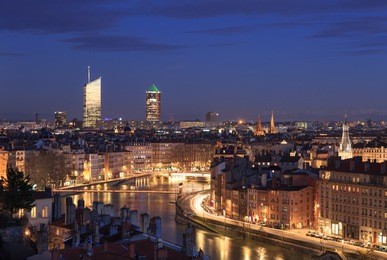 evening view over the saone river in the city of lyon, france.