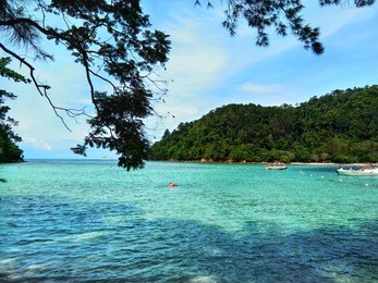 beautiful landscape with a view of the beach at sapi island, sabah malaysia.