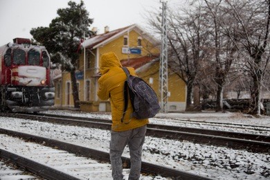 image of a traveler's snowy railway
