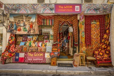 street view of colourful fabric shop in plaka district of athens, athens, greece, europe 12 october 2017