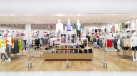 clothing store, abstract blurred fashion boutique shop background in shopping mall, men zone