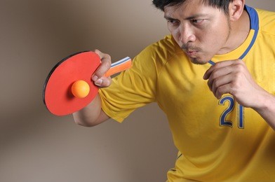 table tennis man hit ping-pong ball
