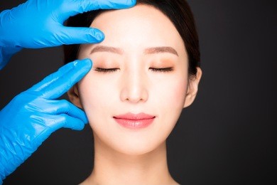 closeup  young woman face with medical beauty concept