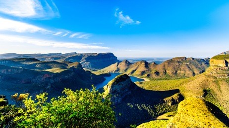 view of the sunset over the blyde river dam and blyde river canyon from the three rondavels viewpoint on the panorama route in mpumalanga province of south africa	