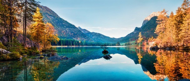 fantastic autumn panorama on hintersee lake. colorful morning view of bavarian alps on the austrian border, germany, europe. beauty of nature concept background.
