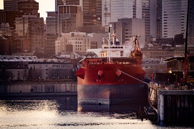downtown montreal sunset cityscape with a boat