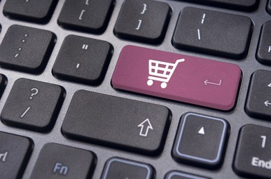 online shopping or internet shop concepts, with shopping cart symbol.