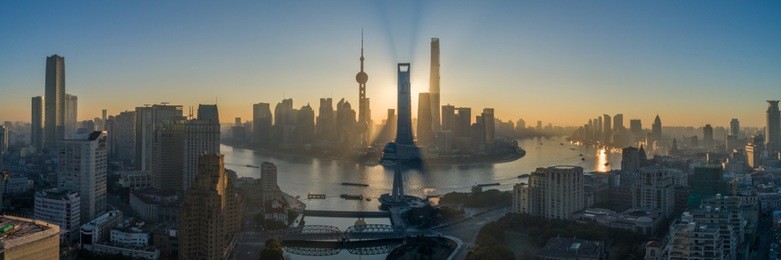 shanghai skyline and huangpu river at sunrise. lujiazui district. panoramic aerial view.