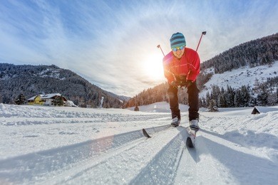 cross-country skiing. young man doing outdoor exercise. winter sport and healthy lifestyle.