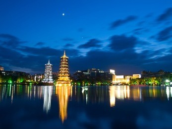 banyan lake pagodas, guilin, china ,one represents the sun, the other the moon