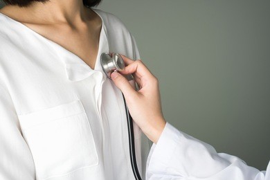 doctor is using a stethoscope for patients patient examination. to hear the heart rate, for patients with heart disease.