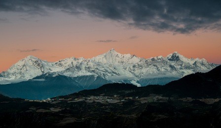 the peak of the meili mountains at sunrise kawagarbo in yunnan