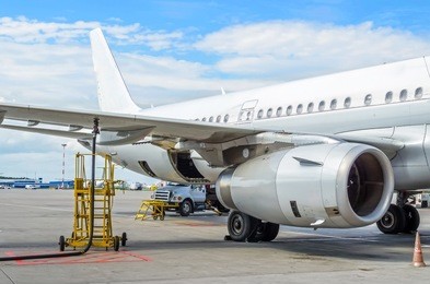 fueling aircraft, view of the wing, hose, engine airport service