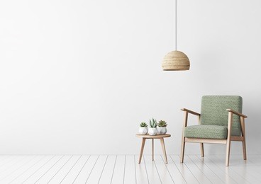 interior mock up with green fabric armchair, coffee table, succulents and hanging lamp in living room with white wall. 3d rendering.