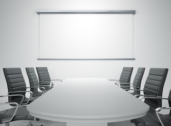 an empty meeting room and conference table