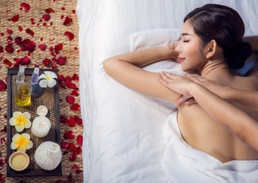 asian lady relax with masage and spa in resort, this photo can use for skin care, spa, massage, healthy, holiday and relax concept
