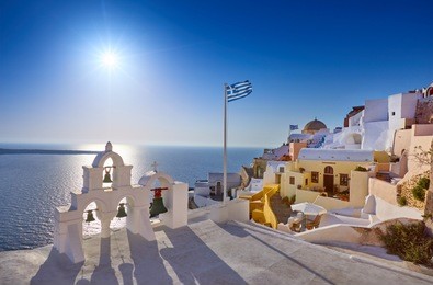 church of santorini. fira town on santorini island, greece. incredibly romantic sunset on santorini. oia village in the morning light. amazing sunset view with white houses. island lovers