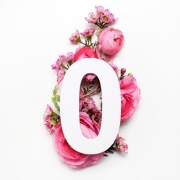 layout with colorful flowers, leaves and number zero. flat lay. top view.