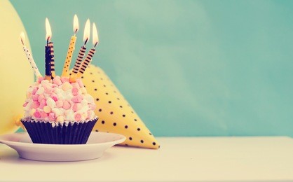 birthday cake with candle in vintage color