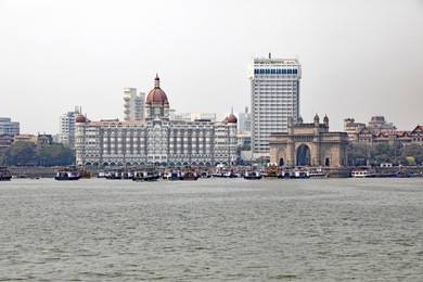 the skyline of mumbai, india, with heavy air pollution creating haze, and smog, an unhealthy situation.