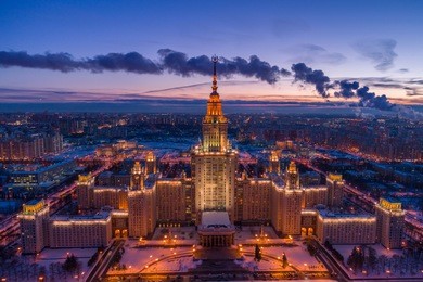 illuminated moscow state university at frosty winter evening. aerial view.