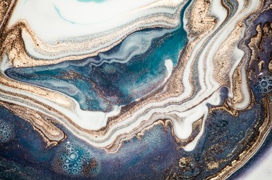 trendy style incorporates the swirls of marble or the ripples of agate for a luxe effect. ebru