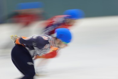 motion blurred image of short track speed skating competitions