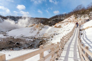 jigokudani or hell valley at noboribetsu onsen town, hot steam vents, sulfurous streams and other volcanic activity, hot spring waters, hokkaido, japan.