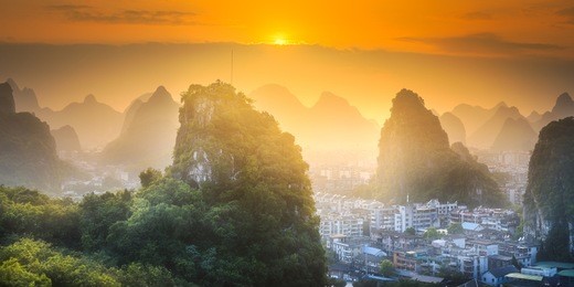 arial view of guilin, li river and karst mountains yangshuo and xingping at sunset, guangxi province, china.