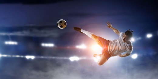 soccer player at stadium. mixed media