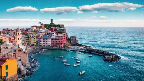 one of the five towns that make up the cinque terre region - vernazza. aerial spring view of liguria, italy, europe. picturesque seascape of mediterranean sea. traveling concept background.