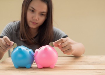 women saving money for future.