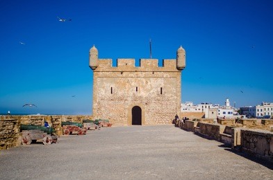 fortified wall of essaouira with cannon and tower