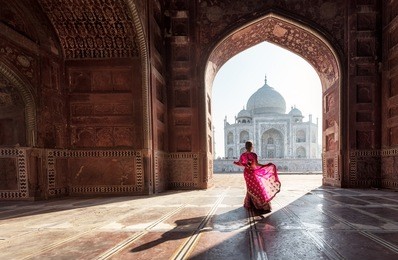 woman in red saree/sari in the taj mahal, agra, uttar pradesh, india