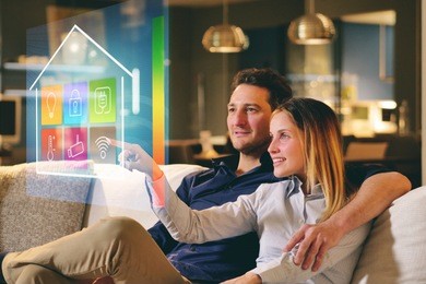 a couple sitting on the sofa controls all the functions of the house such as wi-fi, heating, lighting, television through holography. concept of, home automation, automations, future, technology.