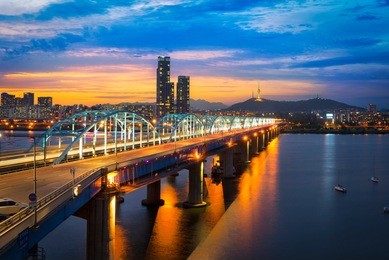 seoul city skyline at dongjak bridge and han river in seoul, south korea.
