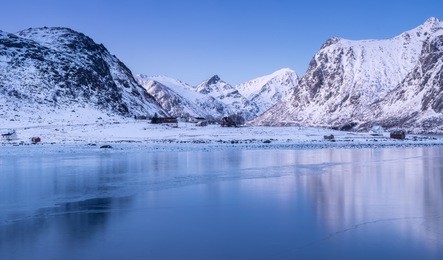 mountain ridge and reflection in the lake. natural landscape in the norway